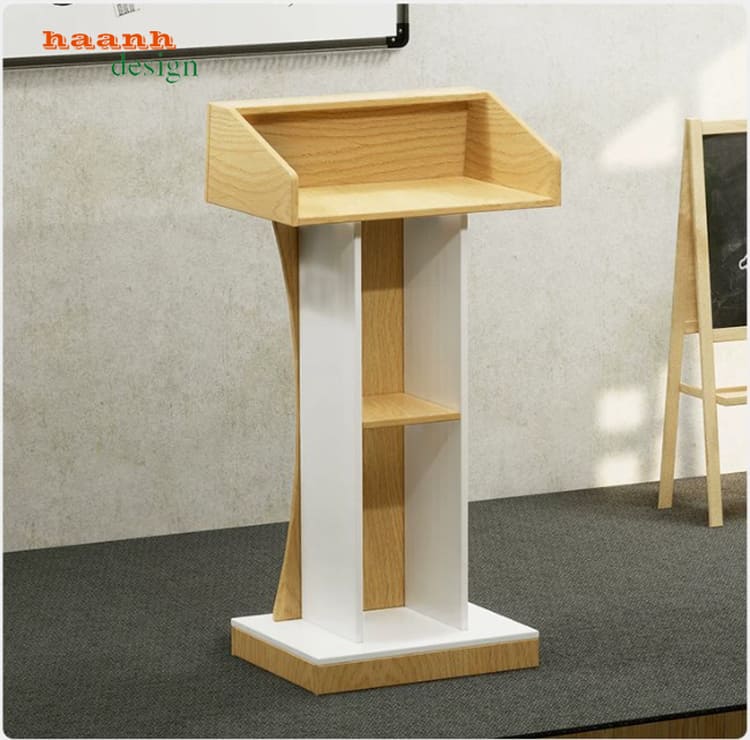 Mặt sau bục phát biểu màu vân gỗ sáng có kệ mở Mặt sau bục phát biểu màu vân gỗ sáng có kệ mở